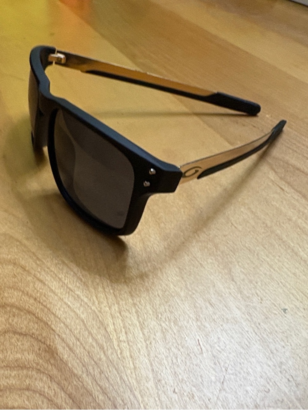 Oakley Black and Gold Sunglasses